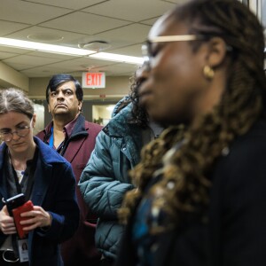 Resilience Healthcare CEO Manoj Prasad listens as Dr. Chidinma Osineme speaks to reporters Wednesday about conditions at West Suburban Medical Center in Oak Park.