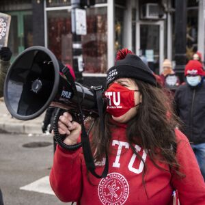 Chicago Teachers Union members and their supporters march and protest in Pilsen after a press conference outside Joseph Jungman Elementary School to call for “safety, equity and trust in any school reopening plan” on Martin Luther King Jr. Day, Monday morning, Jan. 18, 2021.
