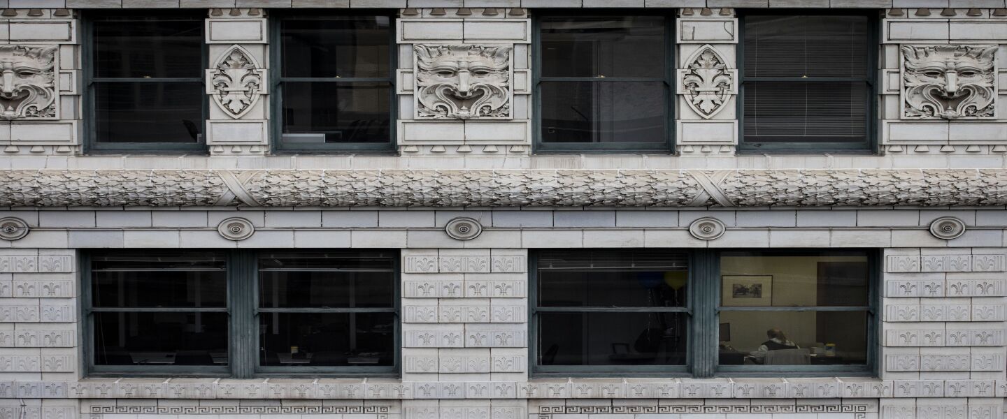 Amid fears of the coronavirus pandemic and a stay-at-home order from Gov. J.B. Pritzker, only one out of four office spaces at 120 W. Washington St. is occupied, as seen from the roof of City Hall, Wednesday morning, April 1, 2020.