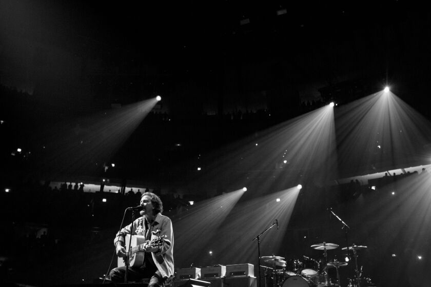 Eddie Vedder entertains the crowd on Tuesday night at the United Center.