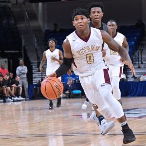 Uplift’s Markese Jacobs (0) runs toward the basket. Worsom Robinson/For the Sun-Times.