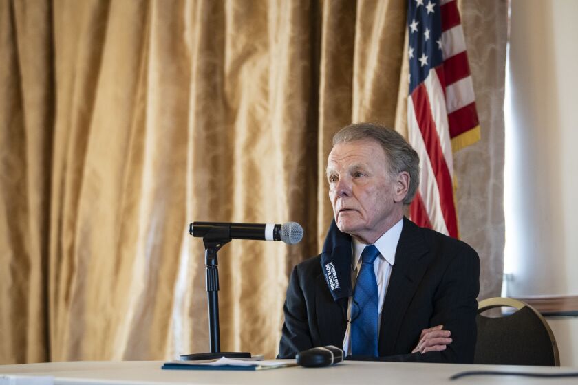 Former House Speaker Michael Madigan attends a Democratic committeepersons meeting to decide who will take over his House seat in February.
