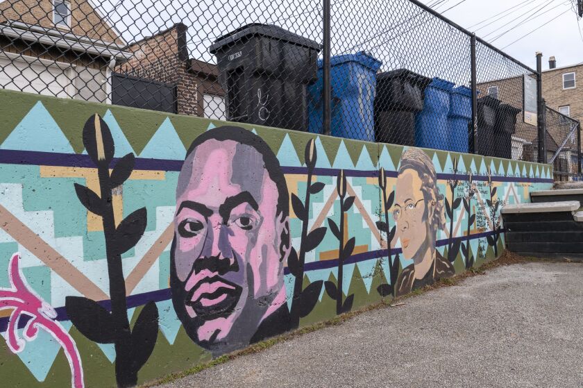 The Rev. Martin Luther King Jr. is among the people pictured in the “Libertad” mural at Barrett Park that was restored in 2022.