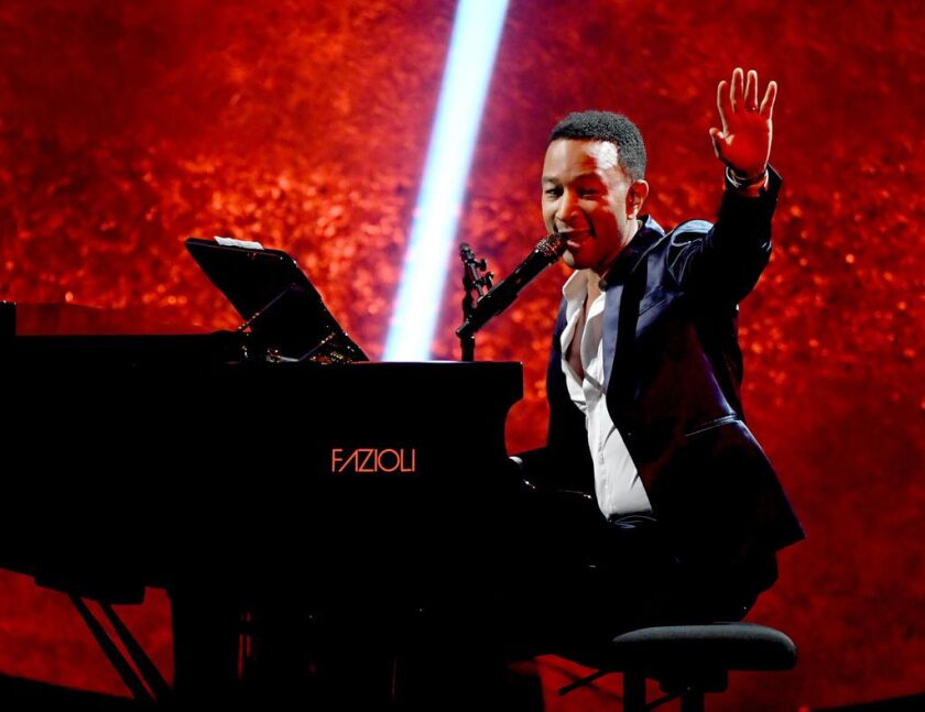John Legend performs at Q85: A Musical Celebration for Quincy Jones earlier this year in Los Angeles. The Oscar-winning singer/composer brings his first-ever Christmas tour to the Civic Opera House on Dec. 13. | Kevin Winter/Getty Images