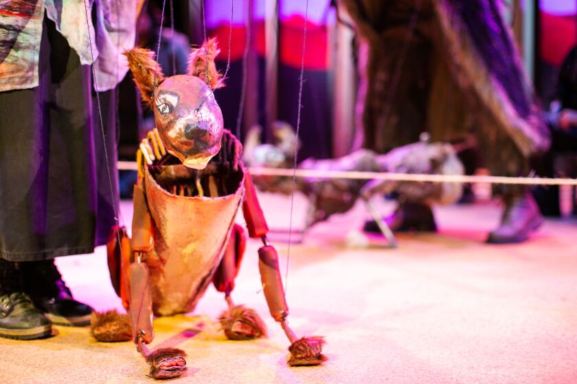 A dog puppet is featured in “Refuge” at Theo Ubique Cabaret. -Puppet design by Adolfo Romero. 