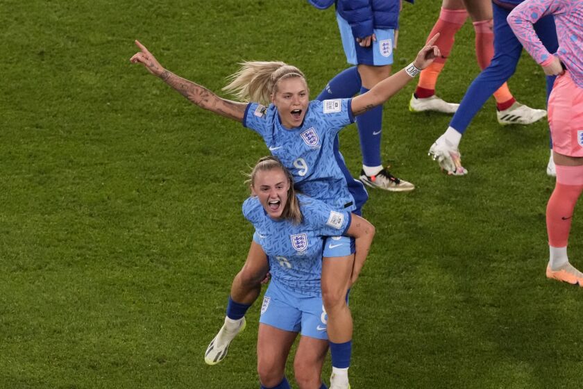 England’s Rachel Daly and Georgia Stanway celebrate after their Women’s World Cup victory over Australia.