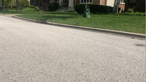 A cracked robin egg shown on a street in Park Ridge.
