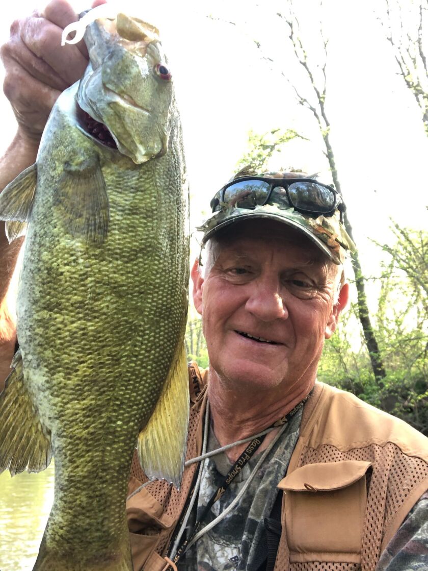 George Peters with a good smallmouth bass from the Vermilion River. Provided photo