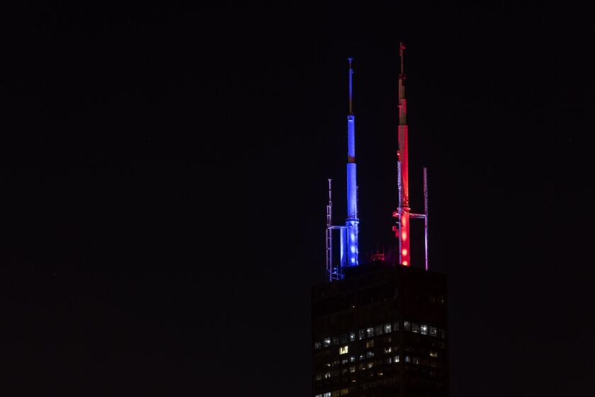 USW shines Biden-Harris 'batlight' on Trump Tower in Chicago