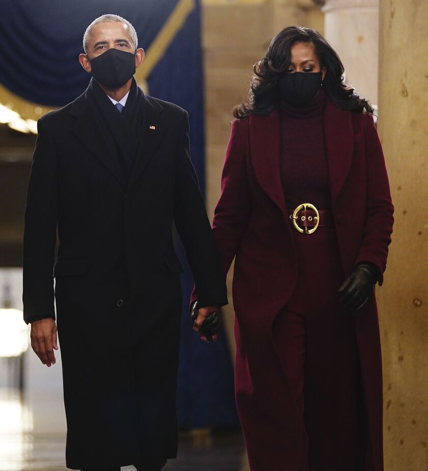 Former President Barack Obama and Michelle Obama arrive in the Crypt of the US Capitol for President-elect Joe Biden’s inauguration ceremony on Wednesday, Jan. 20, 2021 in Washington.