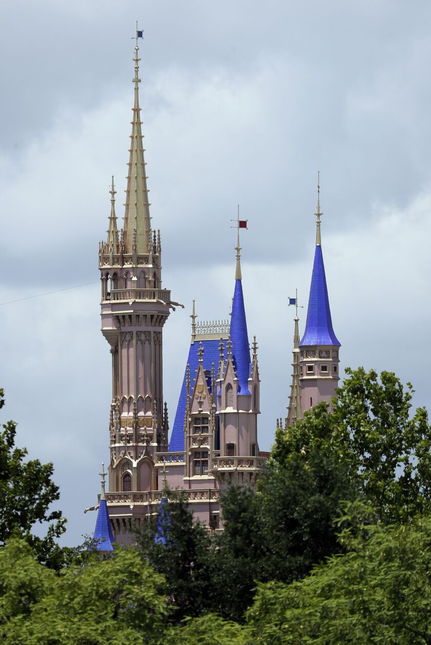 The top of the newly painted Cinderella Castle in the Magic Kingdom is photographed earlier this month at Walt Disney World in Lake Buena Vista, Florida.