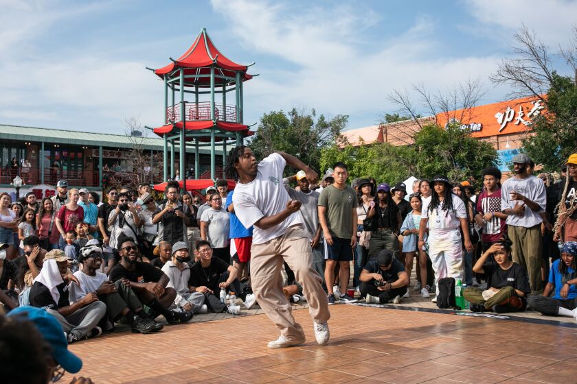 A hip-hop dancer performs during “Youth of Chinatown,” a three-day event featuring hip-hop and K-pop performances at Chinatown Square Plaza, Saturday, Aug. 27, 2022. | Pat Nabong/Sun-Times