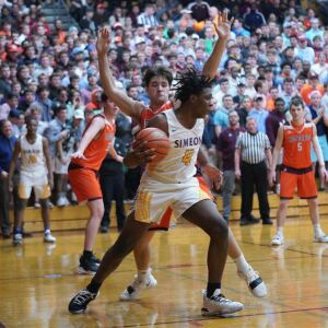 Simeon’s Sincere Callwood (4) makes a move toward the basket, Friday 03-01-19. Worsom Robinson/For Sun-Times