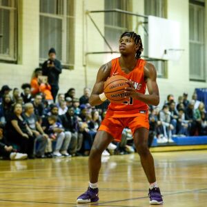 Young’s DJ Steward (21) shoots a free throw during the game against Lincoln Park.