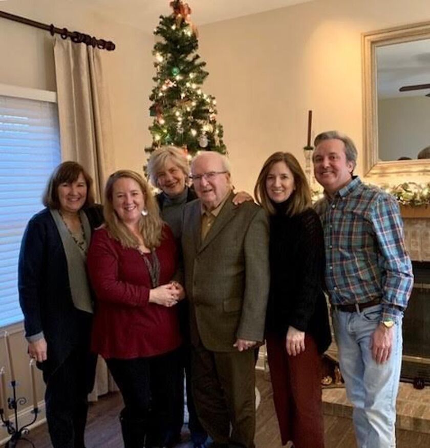 Joe Howard (center) with (from left) daughters Lisa Howard and Colleen Quenan, wife Bunny Gallagher, daughter Jennifer Bullington and son Joseph.