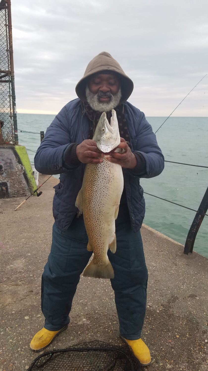 The photograph of Phil Jones with his third big brown trout of the month on the Chicago lakefront is worth a full-length view. Provided photo