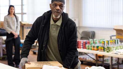 Volunteer Kenny Robinson, Sr. packs boxes at the Chosen Bethel Family Ministries Bread of Life Food Pantry in Englewood on the South Side, Monday, Jan. 26, 2026. | Candace Dane Chambers/Sun-Times.