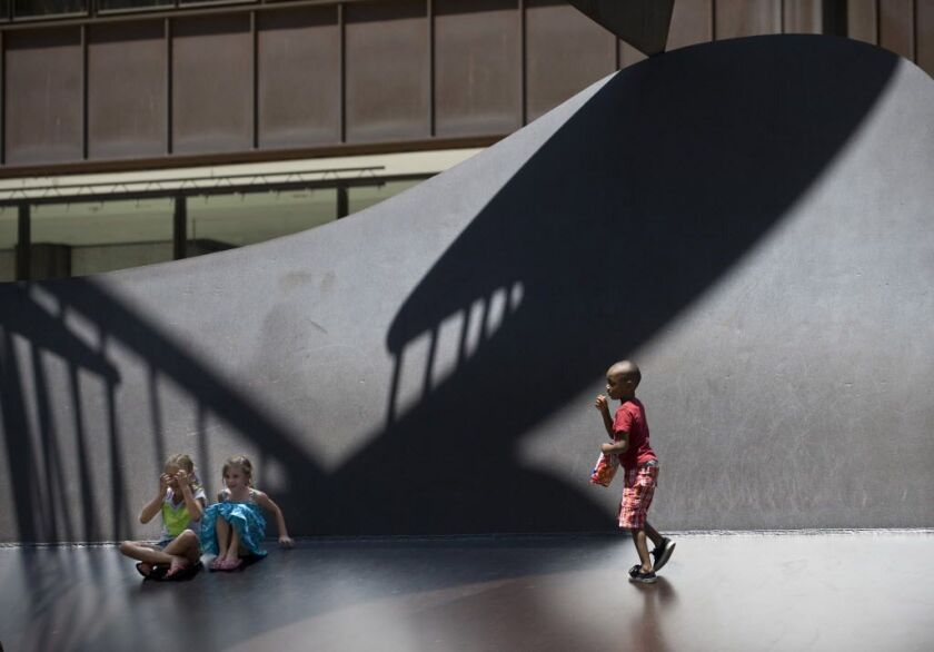 Children play on the Picasso at lunchtime one day in 2014. | Sun-Times eils