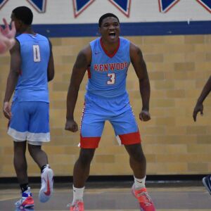 Kenwood’s Lamond Johnson (3) cheers after getting a steal. Worsom Robinson/For the Sun-Times.