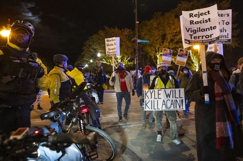 Around 50 people rallied and marched around Chicago’s Loop on Friday, Nov. 19, 2021 to peacefully protest the acquittal of Kyle Rittenhouse.