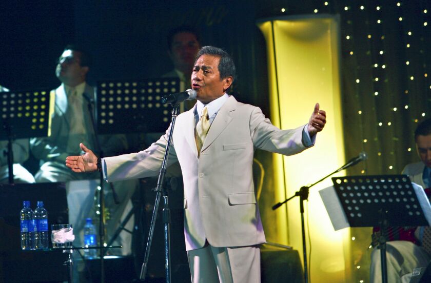 Armando Manzanero performs in Managua, Nicaragua, in 2006. The Mexican master of romantic music who penned Spanish classics such as “Somos Novios” and “Contigo Aprendí,” died Monday.