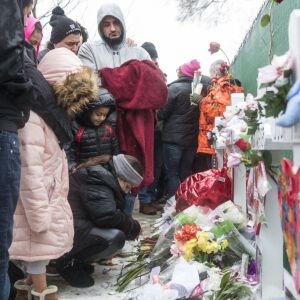 Hundreds of mourners pay their respects at a prayer vigil for the five people killed two days earlier in a mass shooting at the Henry Pratt Company in Aurora, Sunday afternoon, Feb. 17, 2019. | Ashlee Rezin/Sun-Times
