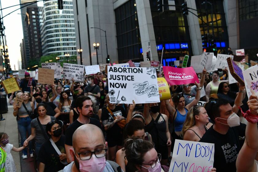 Protesters march in downtown Chicago on Friday, June 24, 2022 after the Supreme Court decision eliminating a constitutional right to an abortion.