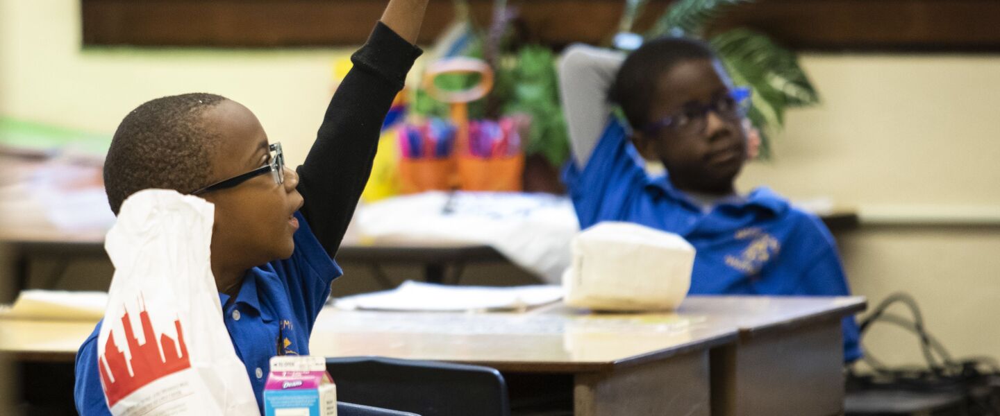 Students eat breakfast at their desks at Roswell B. Mason Elementary School, 1830 S. Keeler Ave., in November.