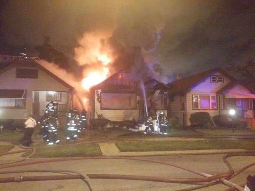 Fire crews at the scene of a fire in the 9900 block of South Wallace early Wednesday. | Fire Media Affairs