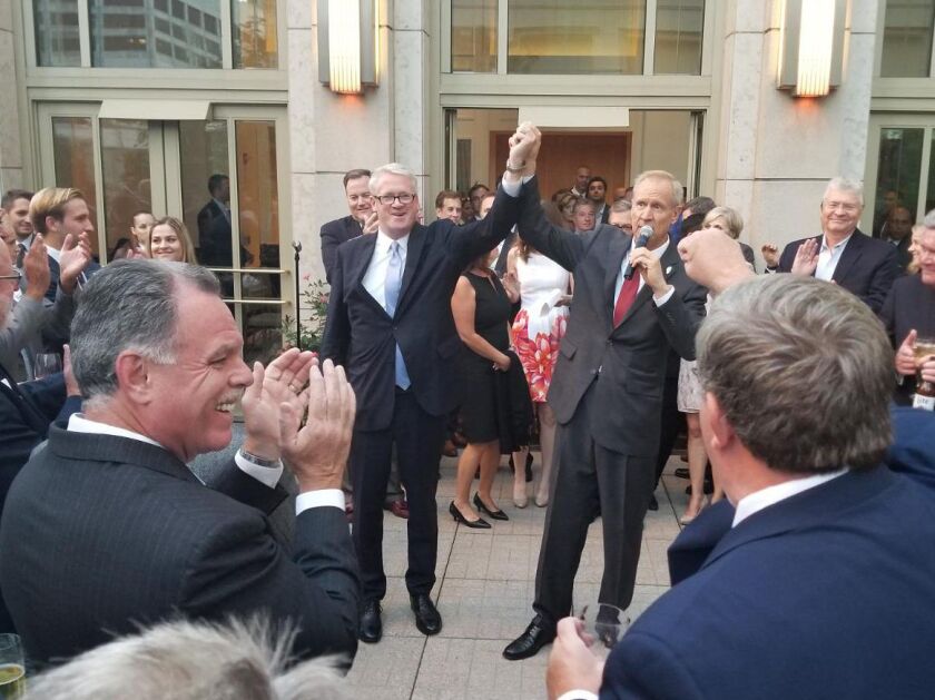 Gov. Bruce Rauner speaks at a fundraiser for House Republican Leader Jim Durkin at the Peninsula Chicago on Tuesday as former Chicago Police Supt. Garry McCarthy (left) applauds. Photo by Tina Sfondeles.