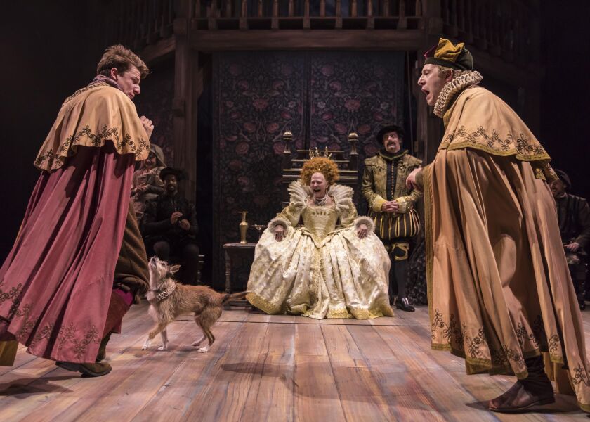 Queen Elizabeth I (Linda Reiter) is delighted by the performance of the dog Spot (Dash) with court actors (Ryan McBride and Fred Geyer) in “Shakespeare in Love,” directed by Rachel Rockwell. | Photo by Liz Lauren.