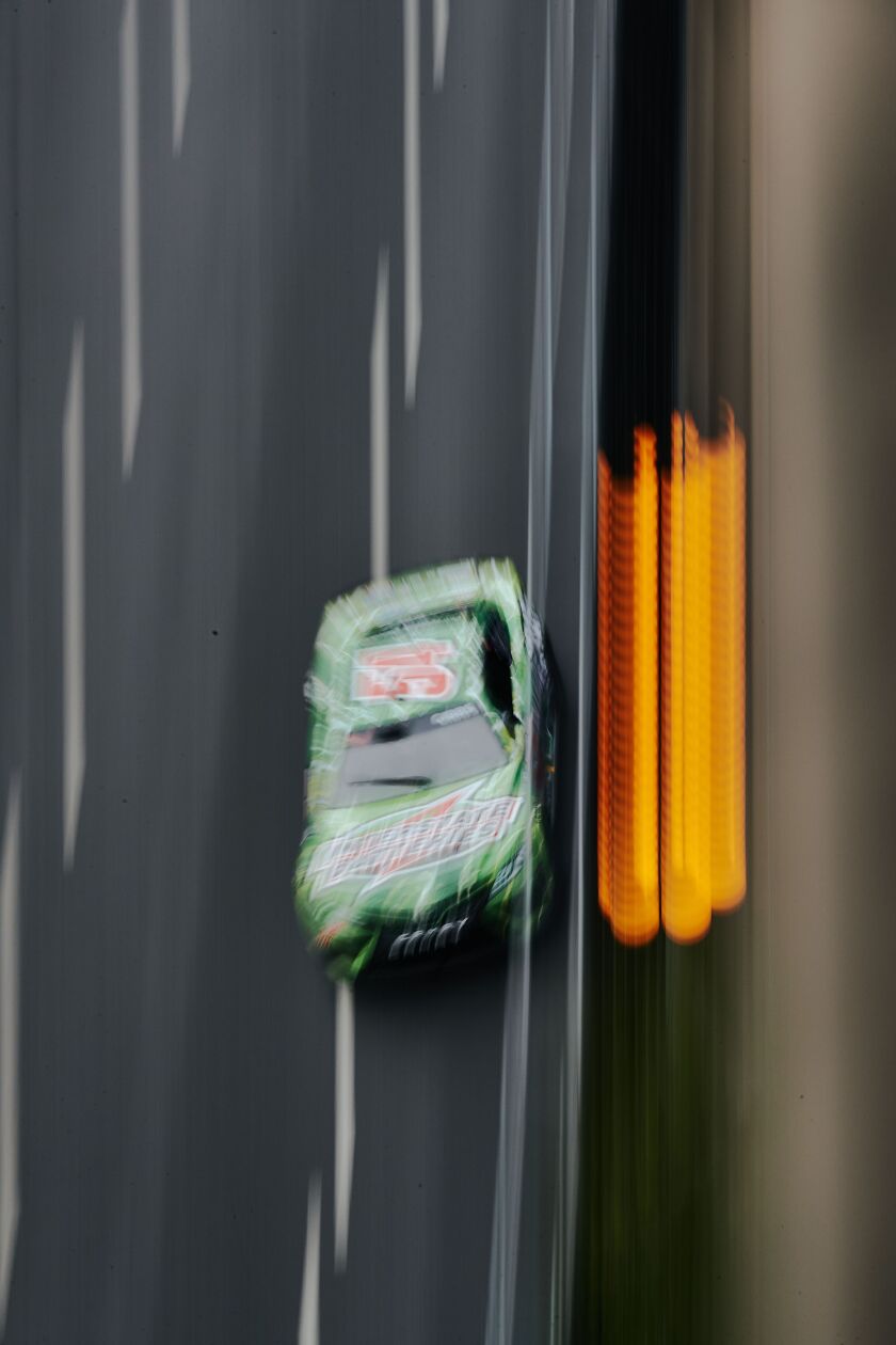 Cars race down S. Michigan Ave during the second day of NASCAR’s first street race in downtown Chicago on Sunday, July 2, 2023.