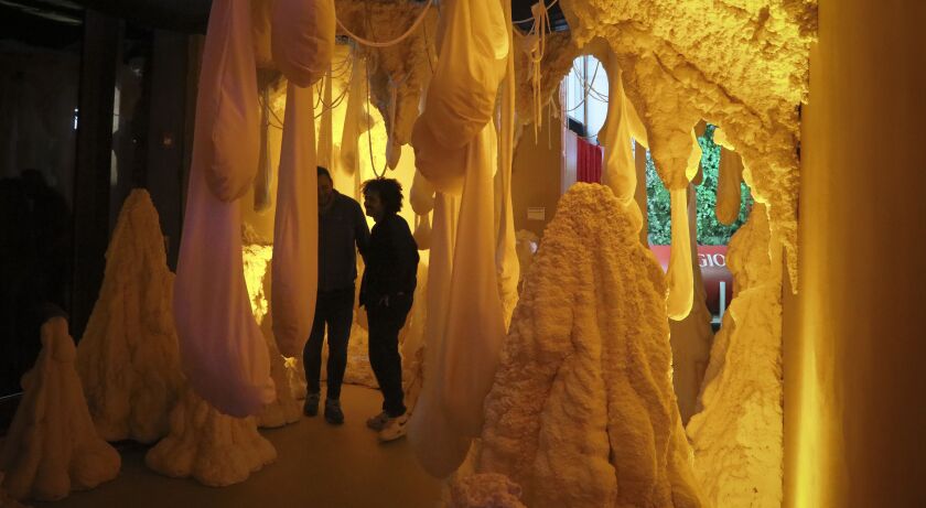 While pizza may be the hook that draws those interested to New York’s Pizza Museum, the focus of MoPi is to expose visitors to the fine art world — even if the education is fed one slice at a time. | Bebeto Matthews/AP
