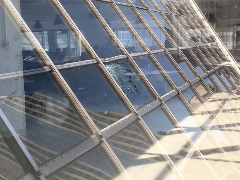 A pane of glass is smashed on the 39th floor of 150 N. Michigan Ave. after scaffolding came loose Tuesday afternoon. | Photo provided by Greg Phelps