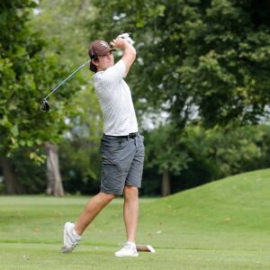 Mount Carmel’s Christopher Whelton looks on after teeing off during practice at Jackson Park Golf Course.