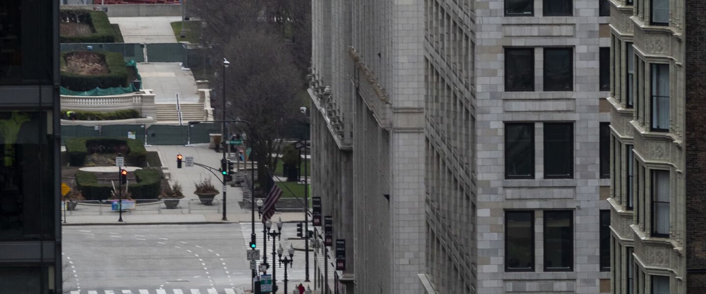 Amid fears of the coronavirus pandemic and a stay-at-home order from Gov. J.B. Pritzker, few pedestrians and minimal traffic could be seen in the Loop, looking east on West Washington Street from the roof of City Hall during the Wednesday morning commute, April 1, 2020.