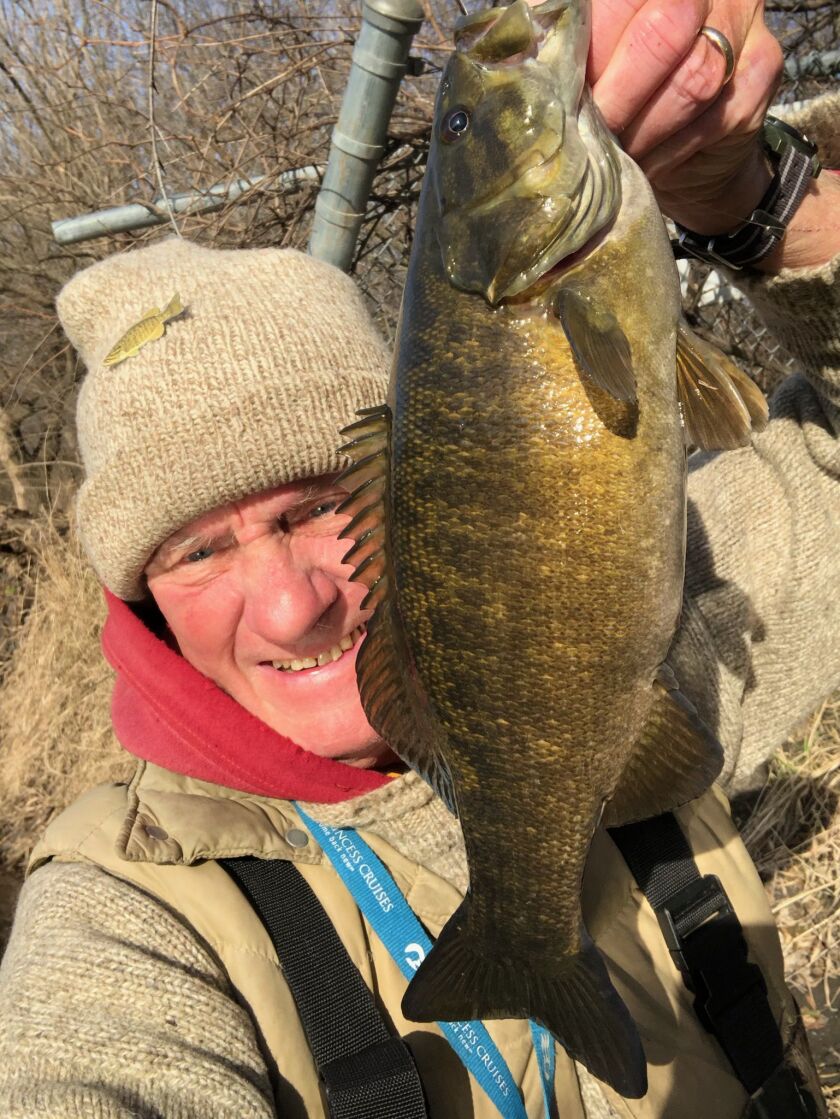 George Peters with a cold-water Kankakee River smallmouth bass. Provided photo