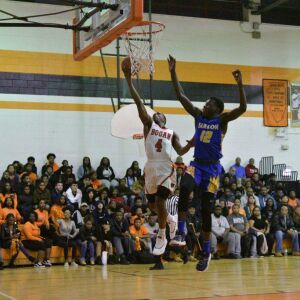 Bogan’s Jordan Booker races to the basket. Worsom Robinson/For the Sun-Times.