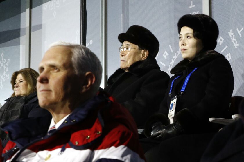 Kim Yo Jong, top right, sister of North Korean leader Kim Jong Un, sits alongside Kim Yong Nam, president of the Presidium of North Korean Parliament, and behind U.S. Vice President Mike Pence as she watches the opening ceremony of the 2018 Winter Olympic