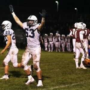 Cary-Grove’s Jason Petko (63) begins the celebration. Allen Cunningham/For the Sun-Times.