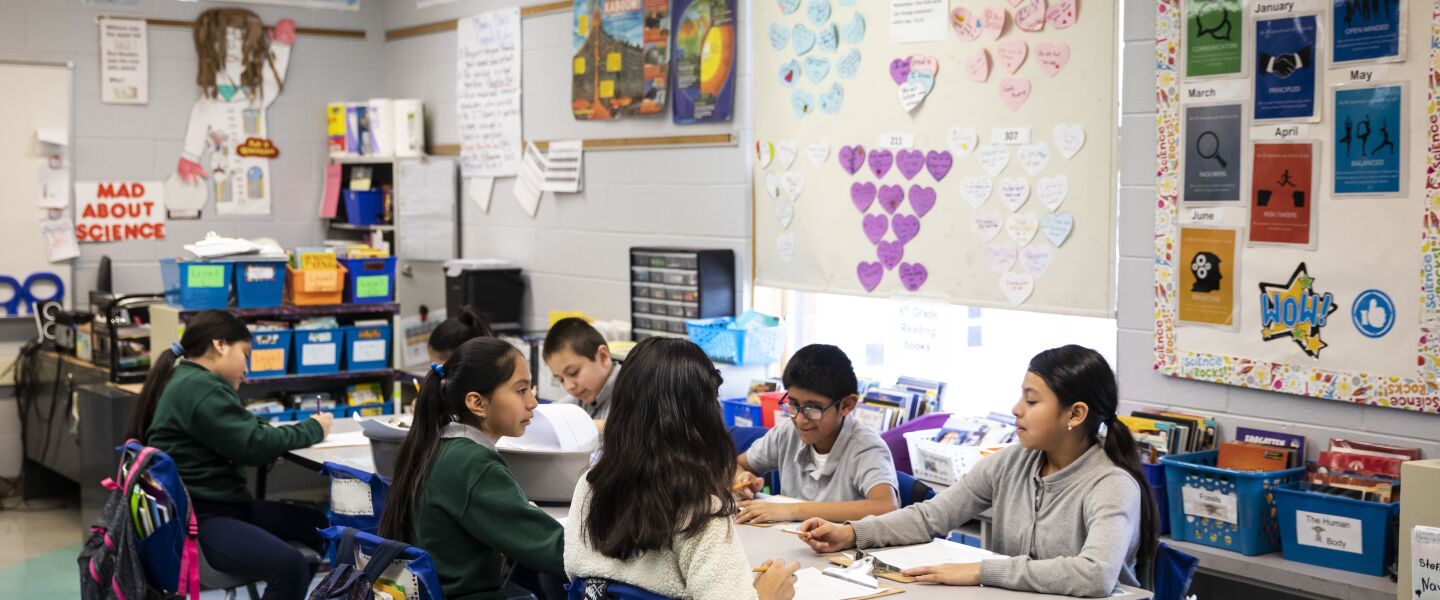 Students in a fifth grade class study science together at Little Village Academy, 2620 S. Lawndale Ave., in February.