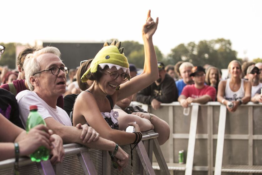 Fans cheer as Dinosaur Jr. performs on day three of Riot Fest in Douglas Park, Sept. 16, 2017. | Ashlee Rezin/Sun-Times