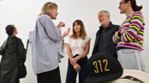 Gallery visitors converse during the Chicago Exhibition Week.