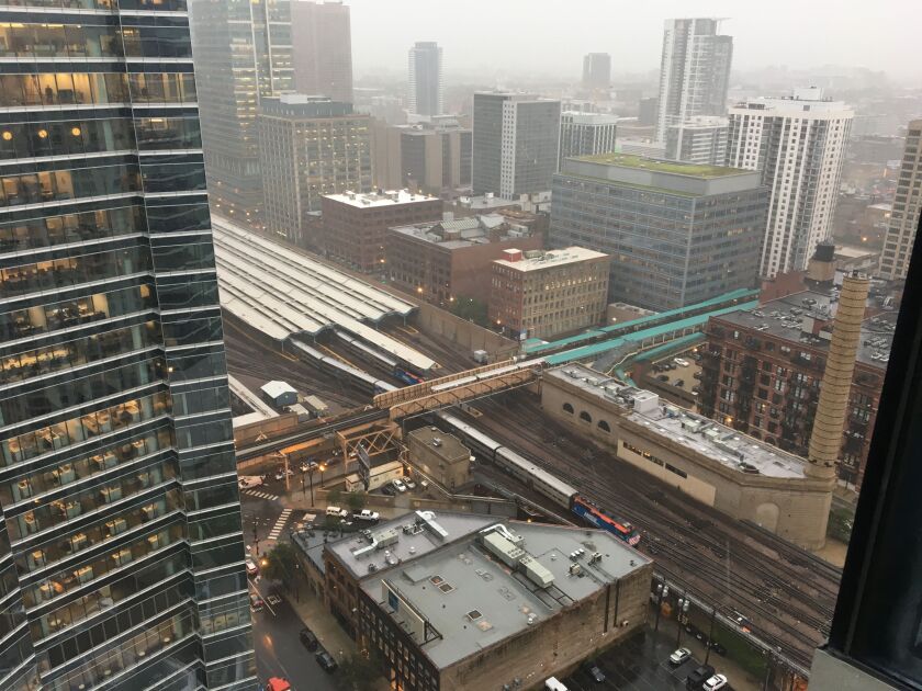 Rain pounds the Ogilvie Transportation Center Thursday morning as<br>Metra commuters stream into the city. | Sun-Times staff photo
