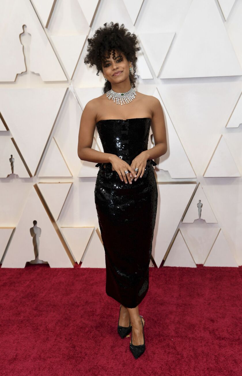 Zazie Beetz, co-star in the Oscar-nominated “Joker,” arrives at the Oscars on Sunday wearing Tom Ford couture.