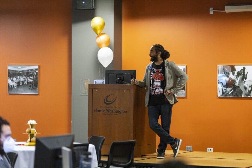 Asif Wilson speaks about the life and legacy of Harold Washington during a commemoration and celebration of Harold Washington’s 100th birthday at the Harold Washington College.