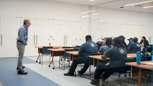 Workers of the Obama Presidential Center gathered for a training on media day this summer.