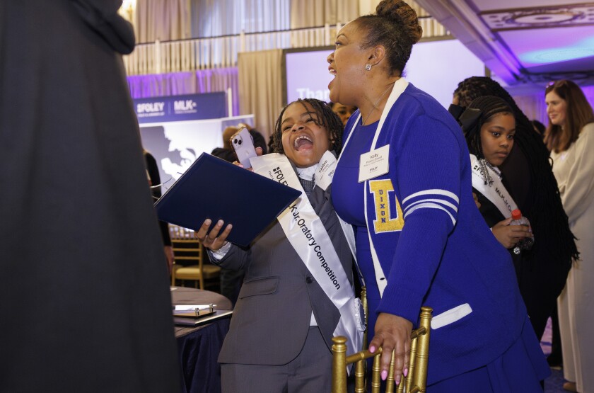 Kaiden Phelps celebrates his second place finish during the 7th annual MLK Jr. Oratory Competition at The Duke Hotel.