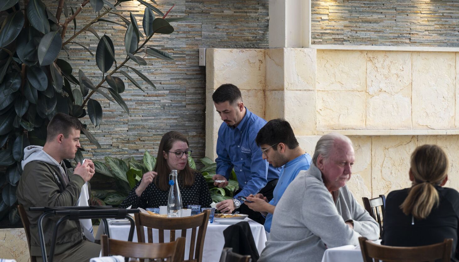 NextImg:Big win for Brandon Johnson, tipped restaurant workers as City Council approves phased elimination of subminimum wage