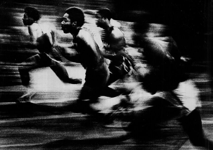 Sun-Times photographer Jack Lenahan won a top prize for his picture “Swish,” the 60-yard dash at a University of Chicago track meet.